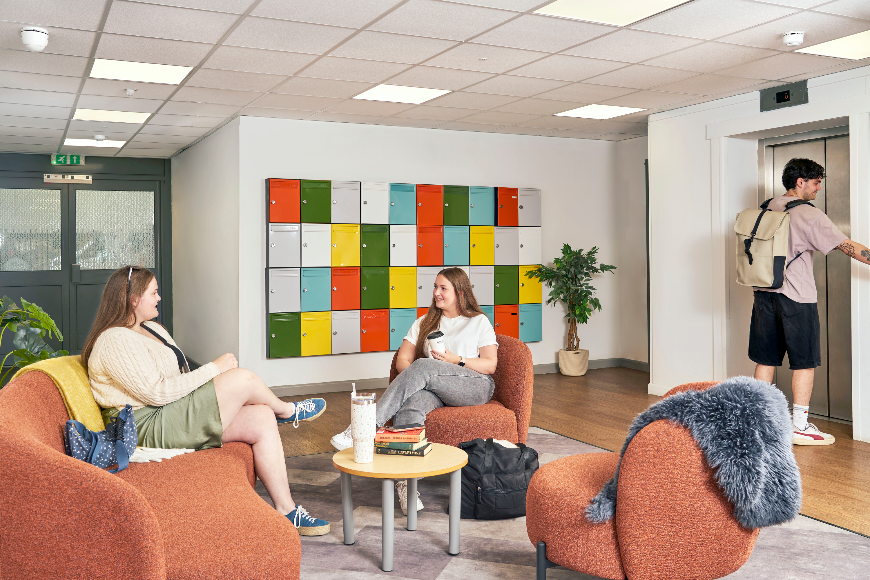 Students in the reception welcome area