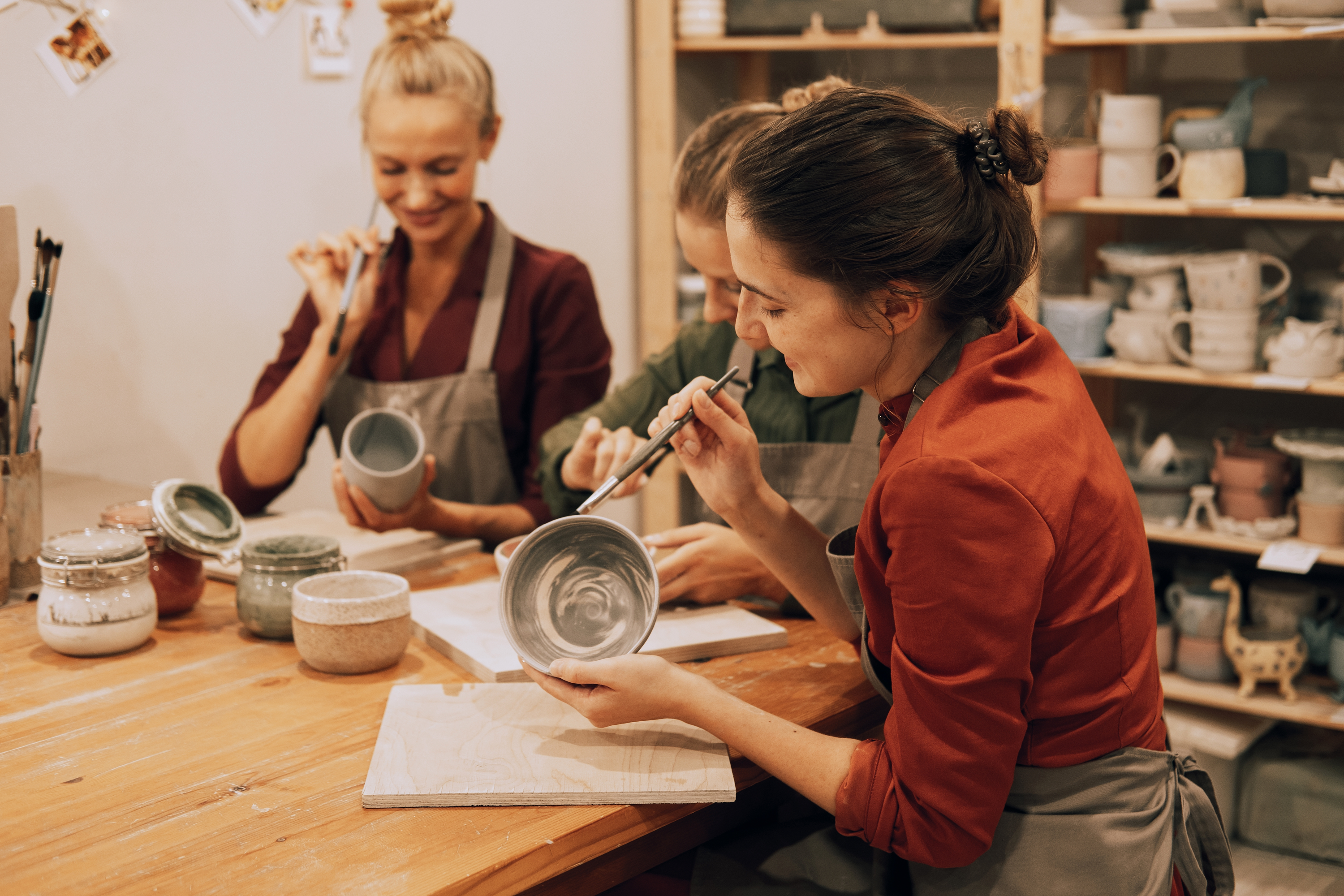 Girls doing pottery together