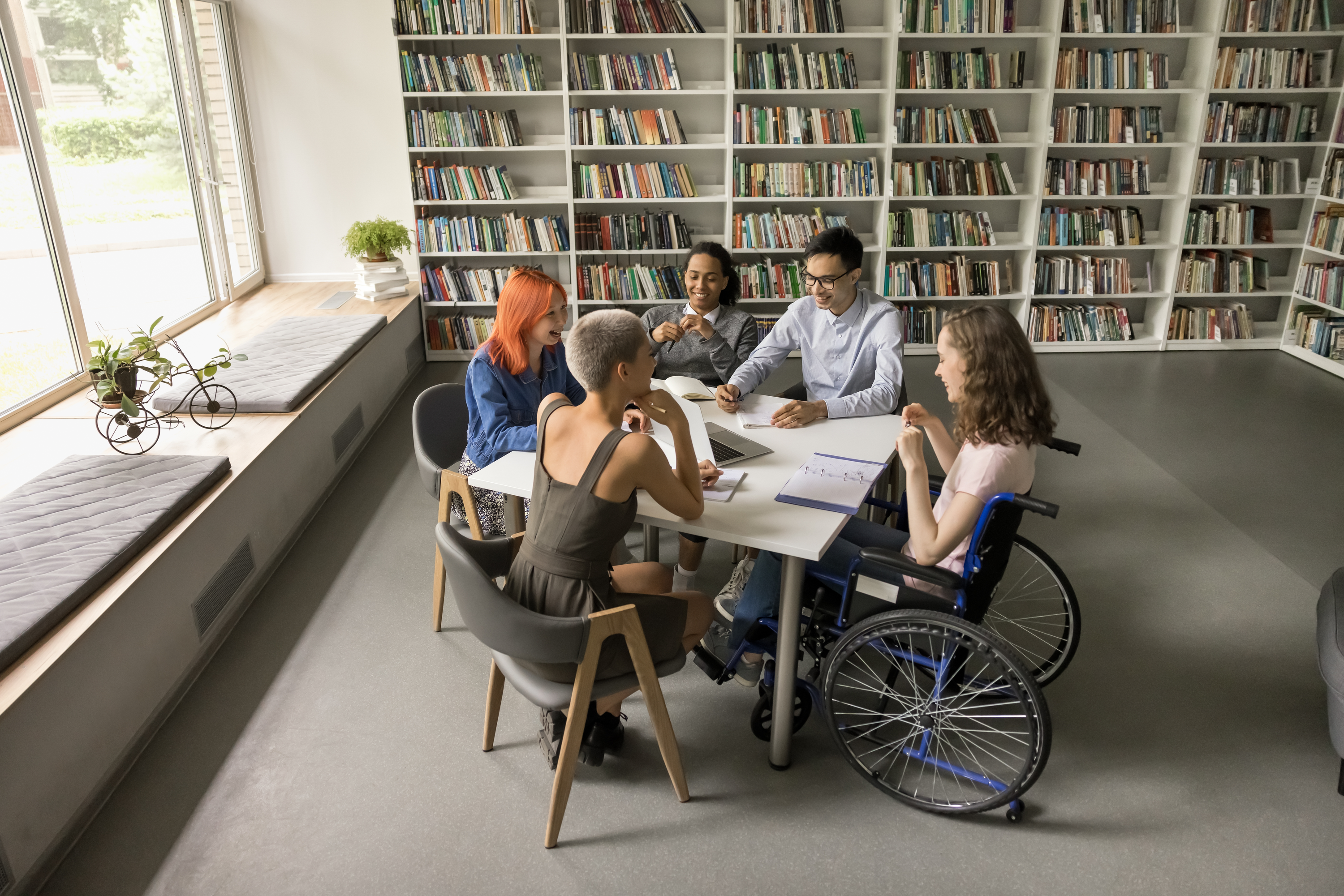 Students sat in a library 