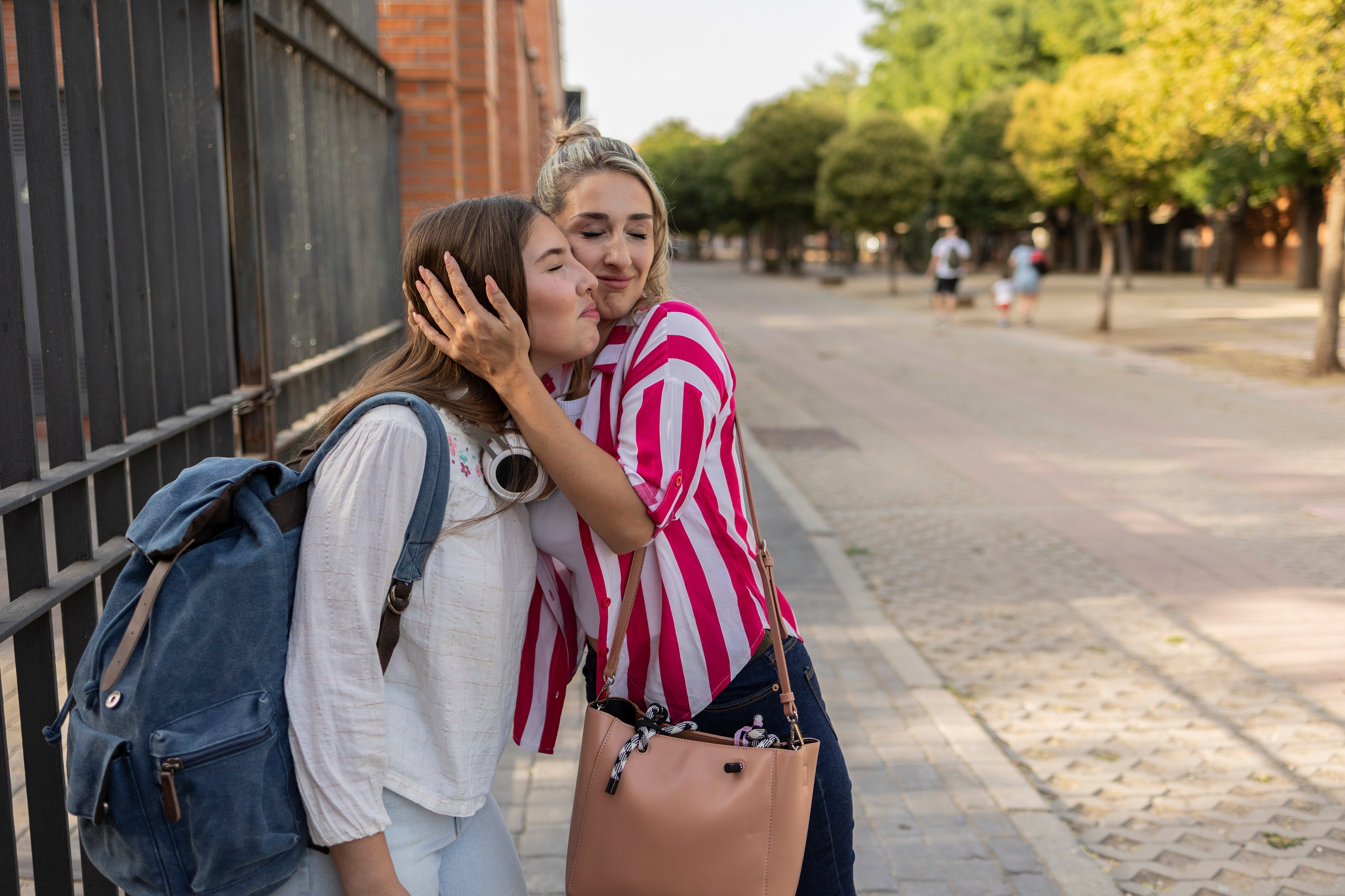 Parent & student standing in the street