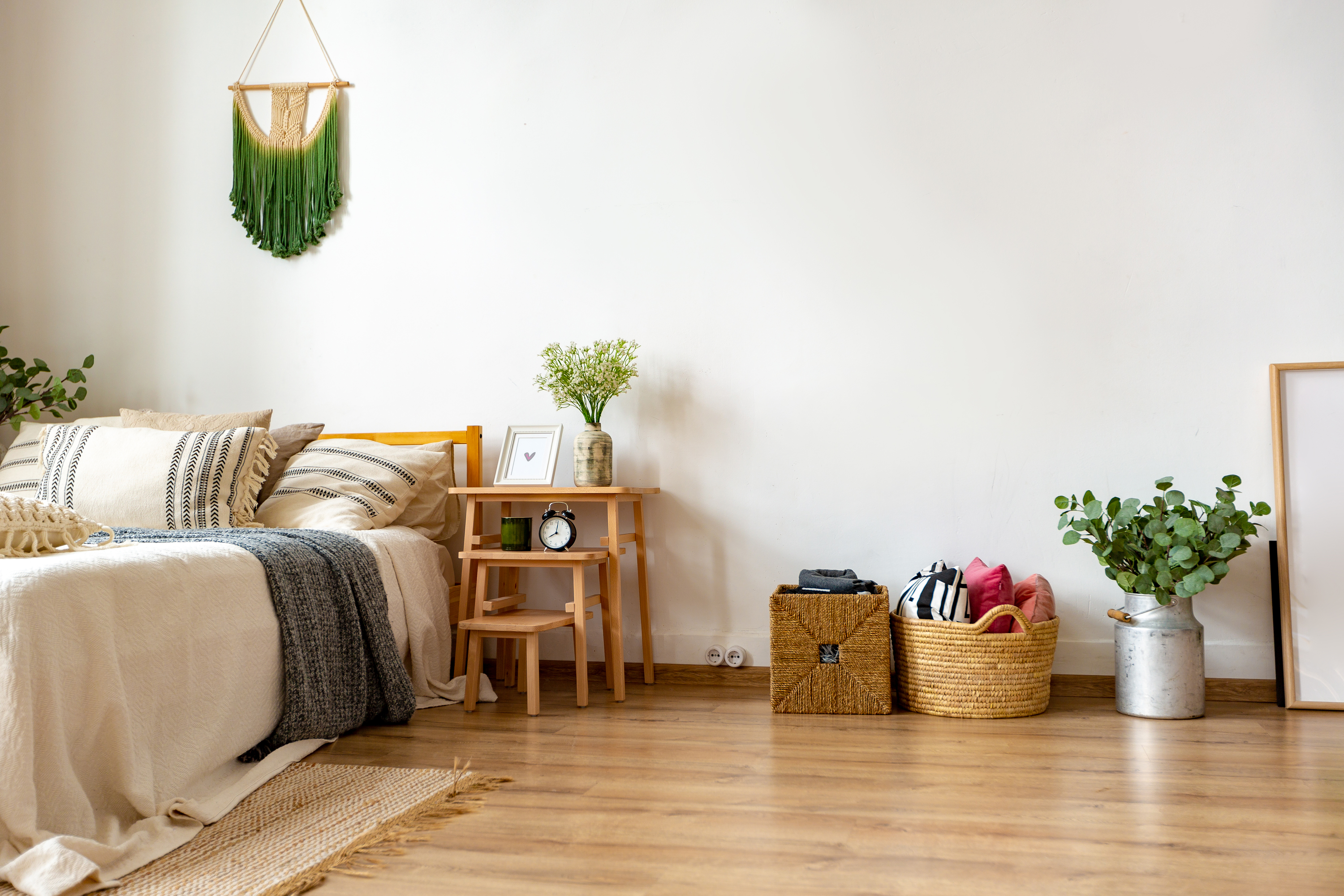 Girl sat in decorated bedroom