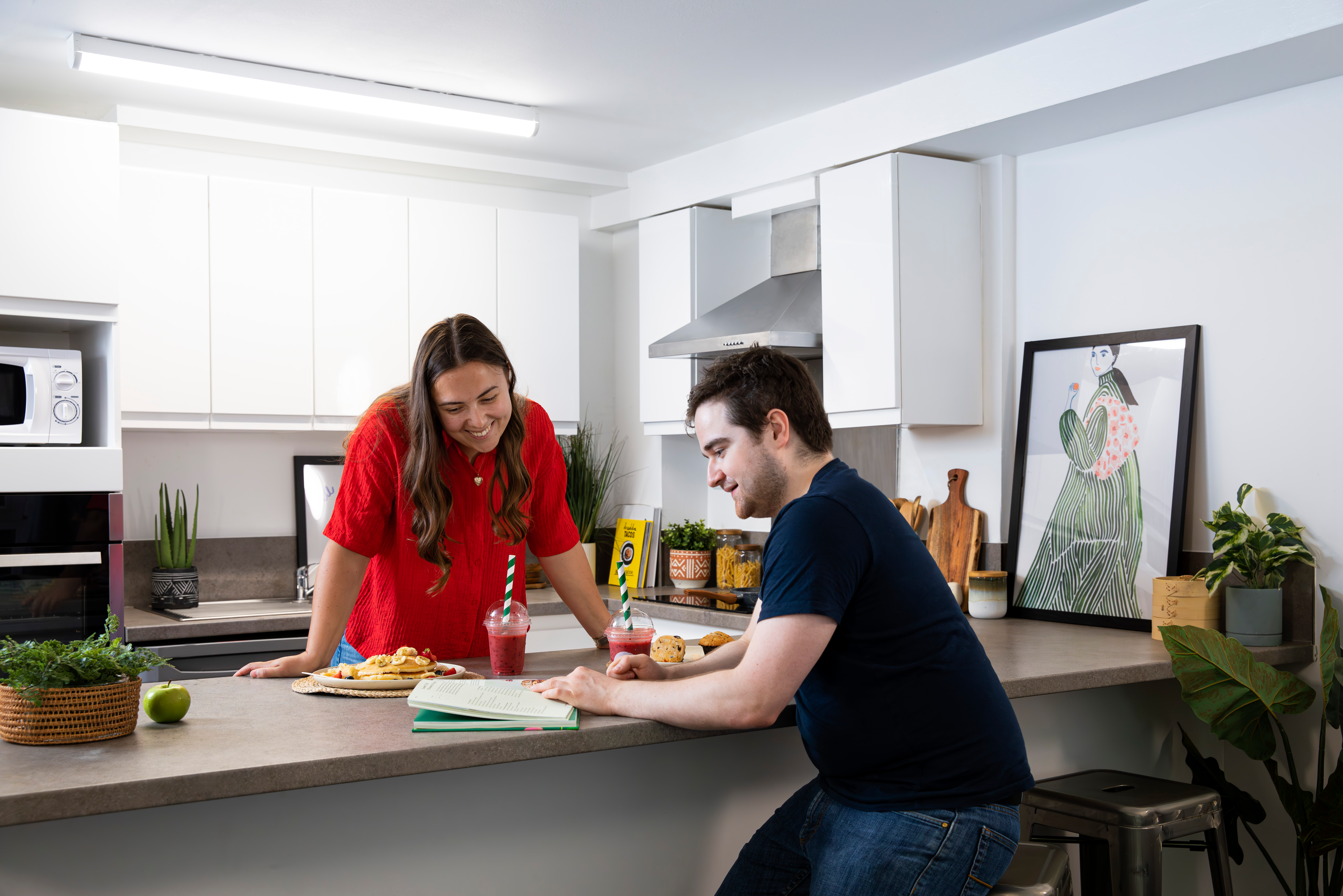Students in a shared kitchen