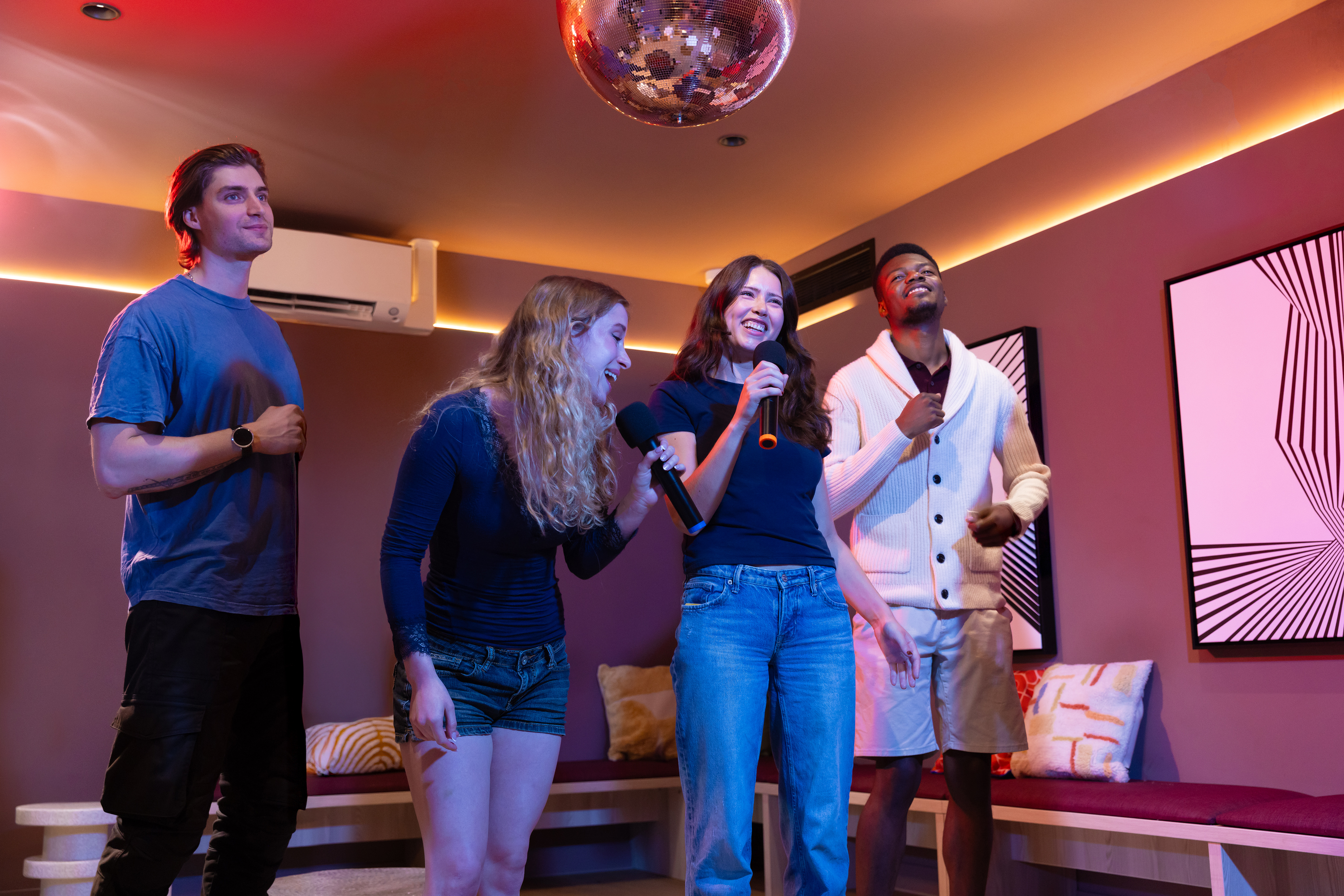 Students singing in karaoke room