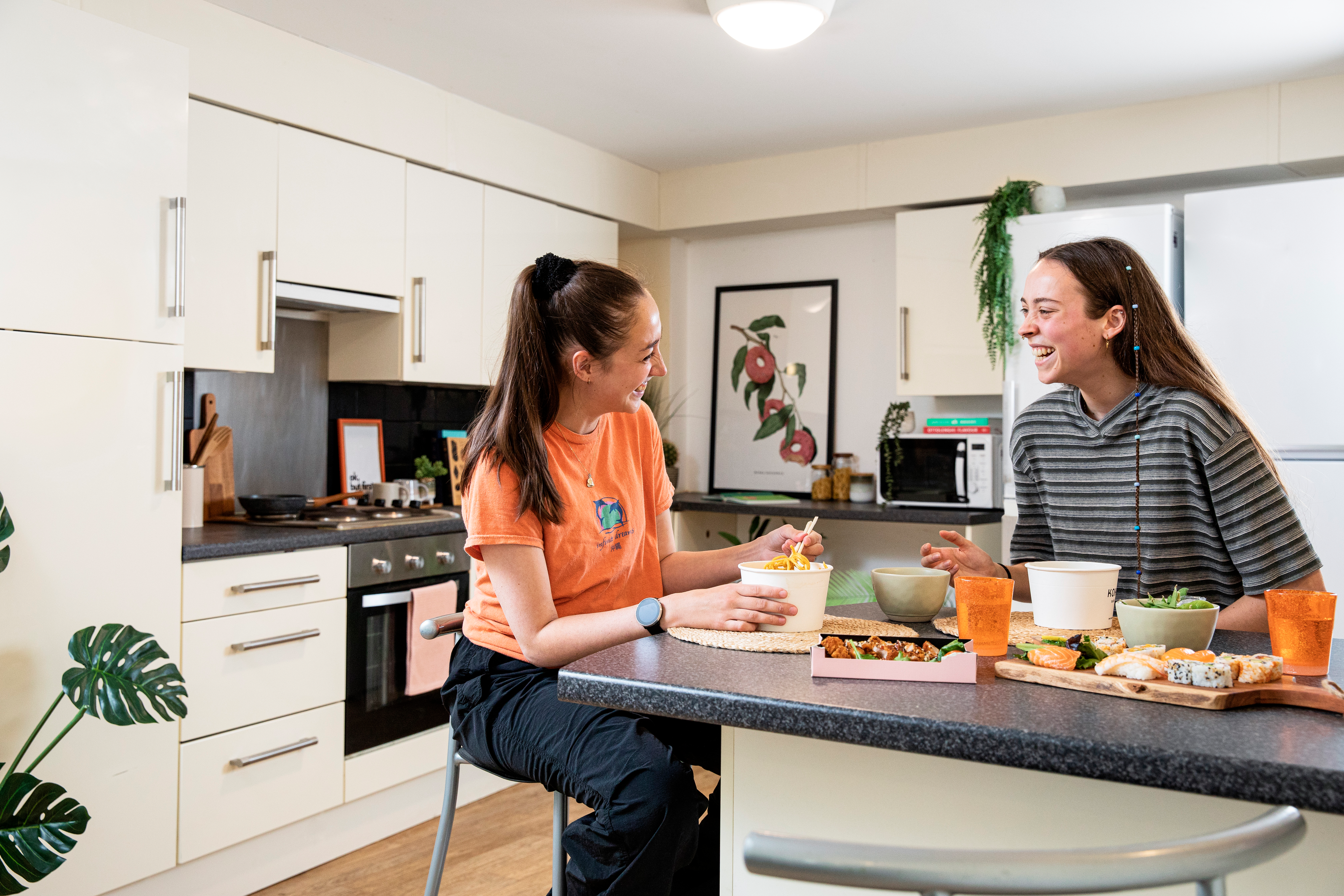 Students in a shared kitchen